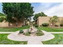 Landscaped courtyard with fountain at 3825 E Camelback Rd # 166, Phoenix, AZ 85018