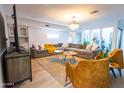Spacious Gathering room with comfortable seating and large TV at 6127 E Mescal St, Scottsdale, AZ 85254