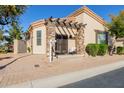 Single story home with stone accents and covered patio at 6202 E Mckellips Rd # 117, Mesa, AZ 85215