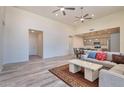 Open floor plan living room, looking toward kitchen at 14825 S Charco Rd, Arizona City, AZ 85123