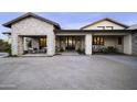Inviting exterior features stone accents and a covered entryway at 25582 N 89Th St, Scottsdale, AZ 85255