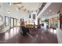 Two-story living room with hardwood floors and a stunning staircase at 5827 N 129Th Ave, Litchfield Park, AZ 85340