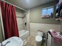 Bathroom with shower/tub combo, toilet, and sink at 6629 N 54Th Dr, Glendale, AZ 85301