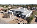 Contemporary home aerial view showcasing a modern design and expansive backyard at 7432 E Wethersfield Rd, Scottsdale, AZ 85260