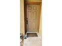 Condo entryway with tan door and number 647 at 1432 W Emerald Ave # 647, Mesa, AZ 85202