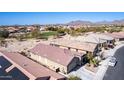 Residential home with a backyard and a view of the neighborhood at 514 S 224Th Dr, Buckeye, AZ 85326