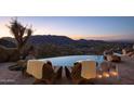 Inviting pool and spa with city views; perfect for relaxing evenings at 5526 E Roadrunner Rd, Paradise Valley, AZ 85253