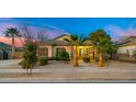 Single-story home with welcoming front porch and mature landscaping at 21752 E Estrella Rd, Queen Creek, AZ 85142