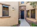 Inviting front entrance with a black wrought-iron door at 4777 S Fulton Ranch Blvd # 1065, Chandler, AZ 85248