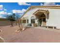 White stucco house with a welcoming entrance at 5830 E Mckellips Rd # 100, Mesa, AZ 85215