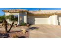 Two-car garage with a spacious driveway at 5830 E Mckellips Rd # 100, Mesa, AZ 85215