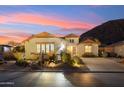Single-story home with desert landscaping, two-car garage, and mountain views at 31538 N Larkspur Dr, San Tan Valley, AZ 85143