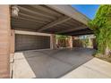 Spacious garage and carport area, offering ample parking and a covered entrance at 15240 N 51St St, Scottsdale, AZ 85254