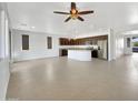 Modern kitchen with dark cabinetry and a large island at 22794 E Via Las Brisas --, Queen Creek, AZ 85142