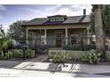 House with a classic design, gated entry, and desert landscaping at 531 E Lynwood St, Phoenix, AZ 85004