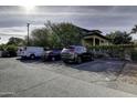 View of the parking area with several vehicles parked at 531 E Lynwood St, Phoenix, AZ 85004