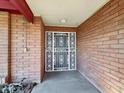 Ornate white metal security door at the entrance at 10329 W Griswold Rd, Peoria, AZ 85345