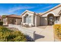 Attractive front entry with walkway and sitting area at 15430 W Amelia Dr, Goodyear, AZ 85395