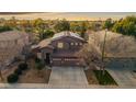 Two-story house with solar panels and a large backyard at 1723 E Cotton Ct, Gilbert, AZ 85234