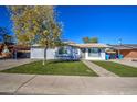 Single story home with modern exterior and front yard at 3530 W Marlette Ave, Phoenix, AZ 85019