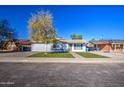 Recently updated home with a well-manicured front yard at 3530 W Marlette Ave, Phoenix, AZ 85019