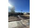 Brick house with a large front yard and walkway at 801 W Earll Dr, Phoenix, AZ 85013