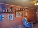 Living room showcasing southwestern art and a relaxing atmosphere at 8221 E Garfield St # L122, Scottsdale, AZ 85257