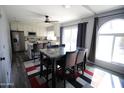 Kitchen and dining area with granite table and modern decor at 903 W Loughlin Dr, Chandler, AZ 85225