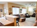 Kitchen with island, breakfast bar, and view into living room at 1414 N Estrada --, Mesa, AZ 85207