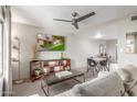 Spacious living room, featuring comfortable furniture and large TV at 1029 E Lodge Dr, Tempe, AZ 85283