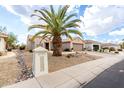 House exterior with desert landscaping and mailbox at 15253 W Pasadena Dr, Surprise, AZ 85374