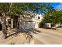 Front view of two-story home with attached garage at 16450 E Ave Of The Fountains -- # 23, Fountain Hills, AZ 85268