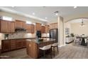 Large kitchen with granite countertops and island at 1807 W Sierra Sunset Trl, Phoenix, AZ 85085