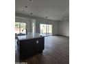 Modern kitchen island with white quartz countertops at 22254 W Skinner Rd, Wittmann, AZ 85361