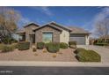 Charming house with stone exterior and desert landscaping at 2480 E Haymore St, Gilbert, AZ 85298