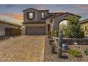 Beautiful two-story home with a well-maintained yard, a two car garage and tasteful desert landscaping at 30704 N 138Th Ave, Peoria, AZ 85383