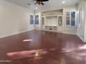 Bright living room featuring hardwood floors and abundant natural light at 741 N Tower Pl, Chandler, AZ 85225
