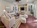 Spacious living room with hardwood floors and built-in entertainment center at 741 N Tower Pl, Chandler, AZ 85225