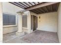 Front entry with a covered patio, column, and tile flooring at 10836 N 29Th Ave, Phoenix, AZ 85029