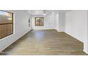 Spacious living room featuring light tile flooring at 1642 W La Salle St, Phoenix, AZ 85041