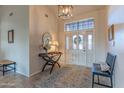 Bright and airy foyer with a decorative console table at 17045 N 58Th Way, Scottsdale, AZ 85254