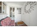 Inviting entryway with a bench and sunburst wall decor at 1825 W Seldon Way, Phoenix, AZ 85021