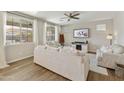 Light and airy living room with ample natural light and neutral decor at 20409 E Escalante Ct, Queen Creek, AZ 85142