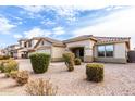 Two-story house with a two-car garage and manicured landscaping at 541 W Prickly Pear Dr, Casa Grande, AZ 85122