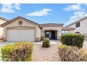 One-story house with a two-car garage and desert landscaping at 541 W Prickly Pear Dr, Casa Grande, AZ 85122