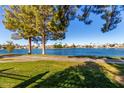 Scenic lakefront view with a walking path at 8270 N Hayden Rd # 1023, Scottsdale, AZ 85258