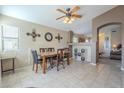 Dining area with a table and chairs, adjacent to the kitchen at 11029 W Mountain View Dr, Avondale, AZ 85323