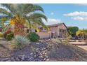 Single-story home with rock landscaping and a dry creek bed at 12911 W Eagle Ridge Ln, Peoria, AZ 85383