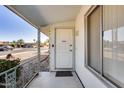 Inviting covered front porch welcomes you to this home at 13219 W Prospect Dr, Sun City West, AZ 85375