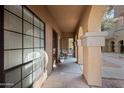 Covered entryway with seating and access to unit at 1702 E Bell Rd # 130, Phoenix, AZ 85022